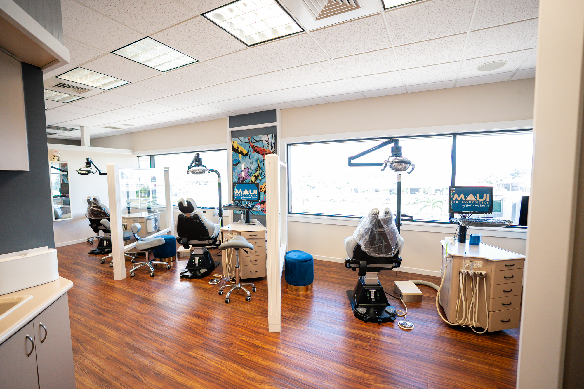 Clean and welcoming Kahului orthodontic office with patient chairs and Maui Orthodontics branding.