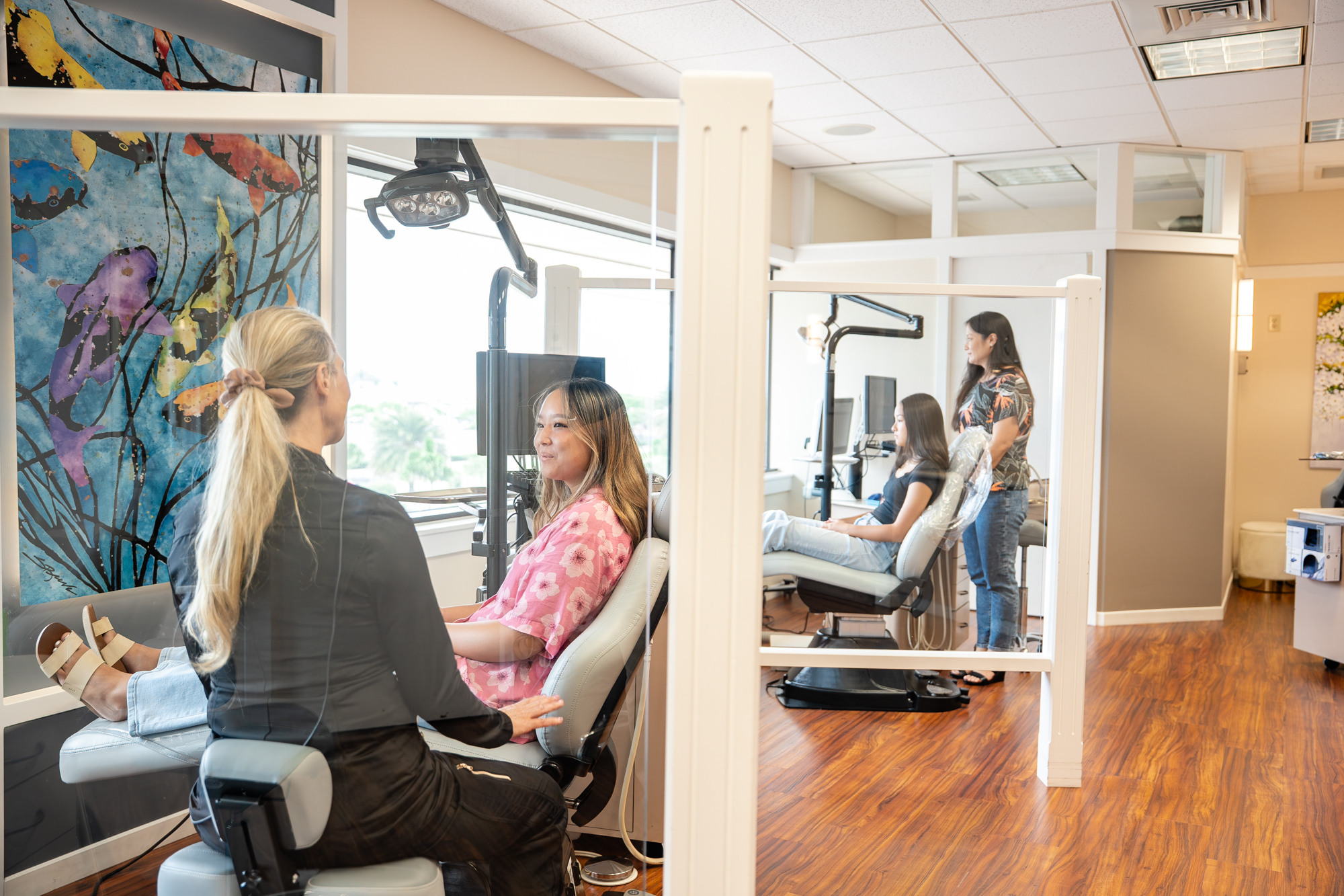 Maui Orthodontics office interior with orthodontist and patient consultation.