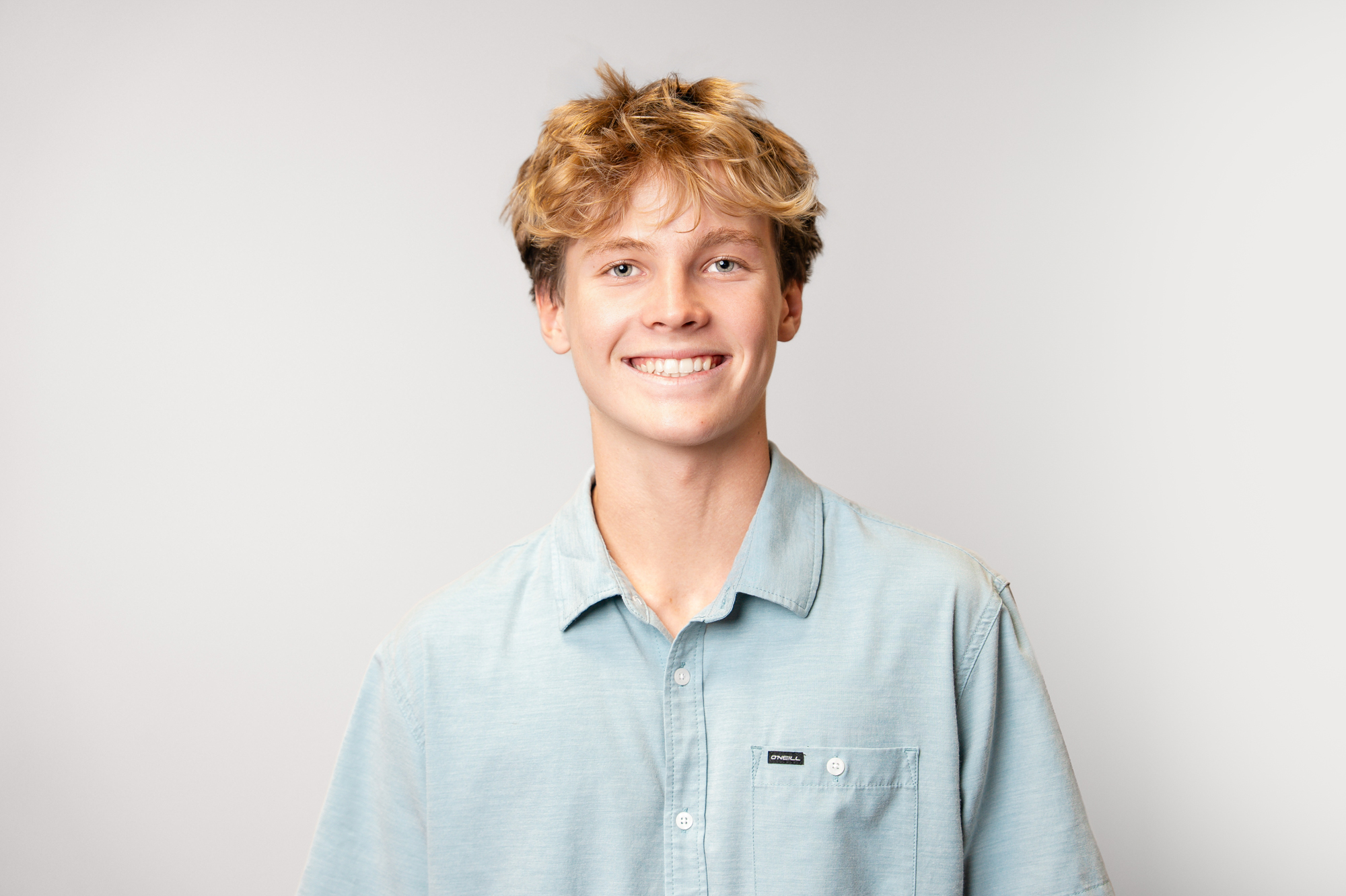 Maui Orthodontics patient smiling with a beautiful, healthy new smile.