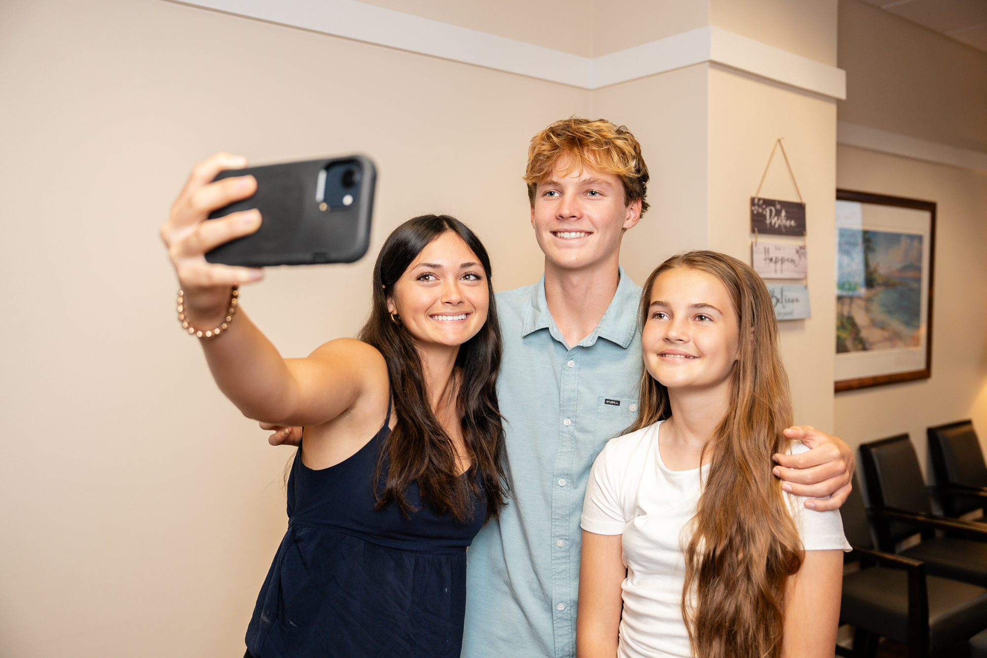 Smiling Maui Orthodontics patient and family portrait showcasing orthodontic care for all ages.